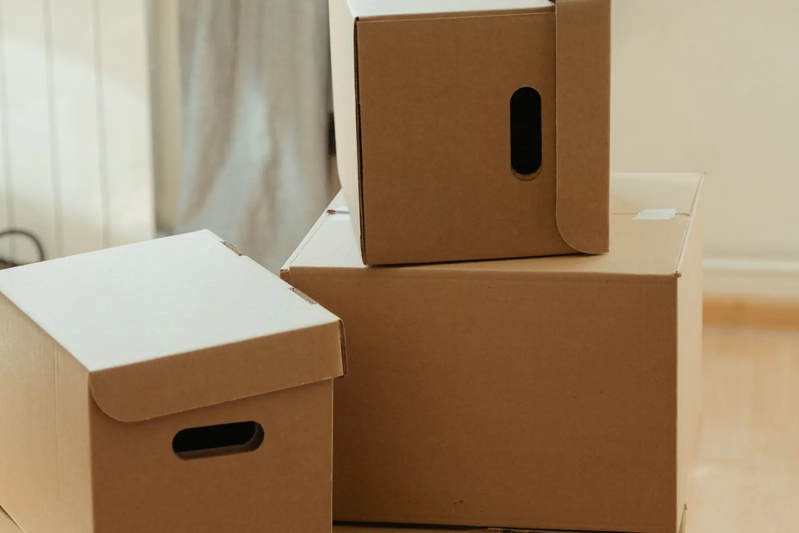 Three moving boxes stacked on top of each other